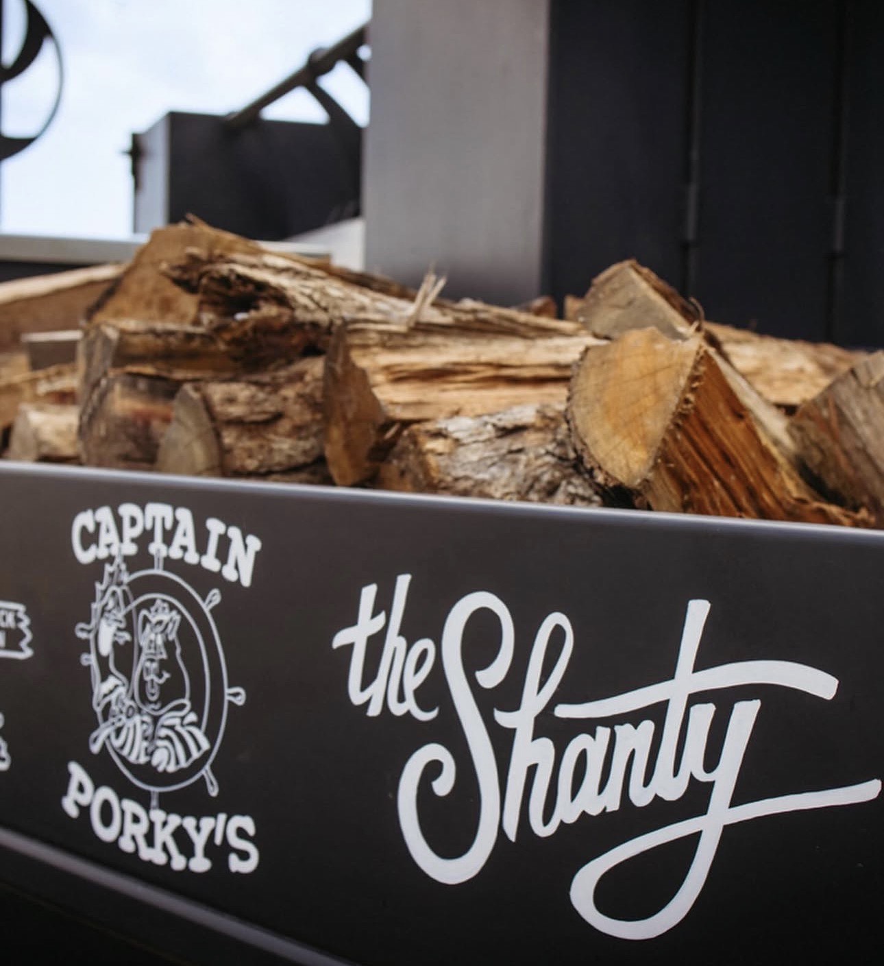 The Shanty smoker branding with wood